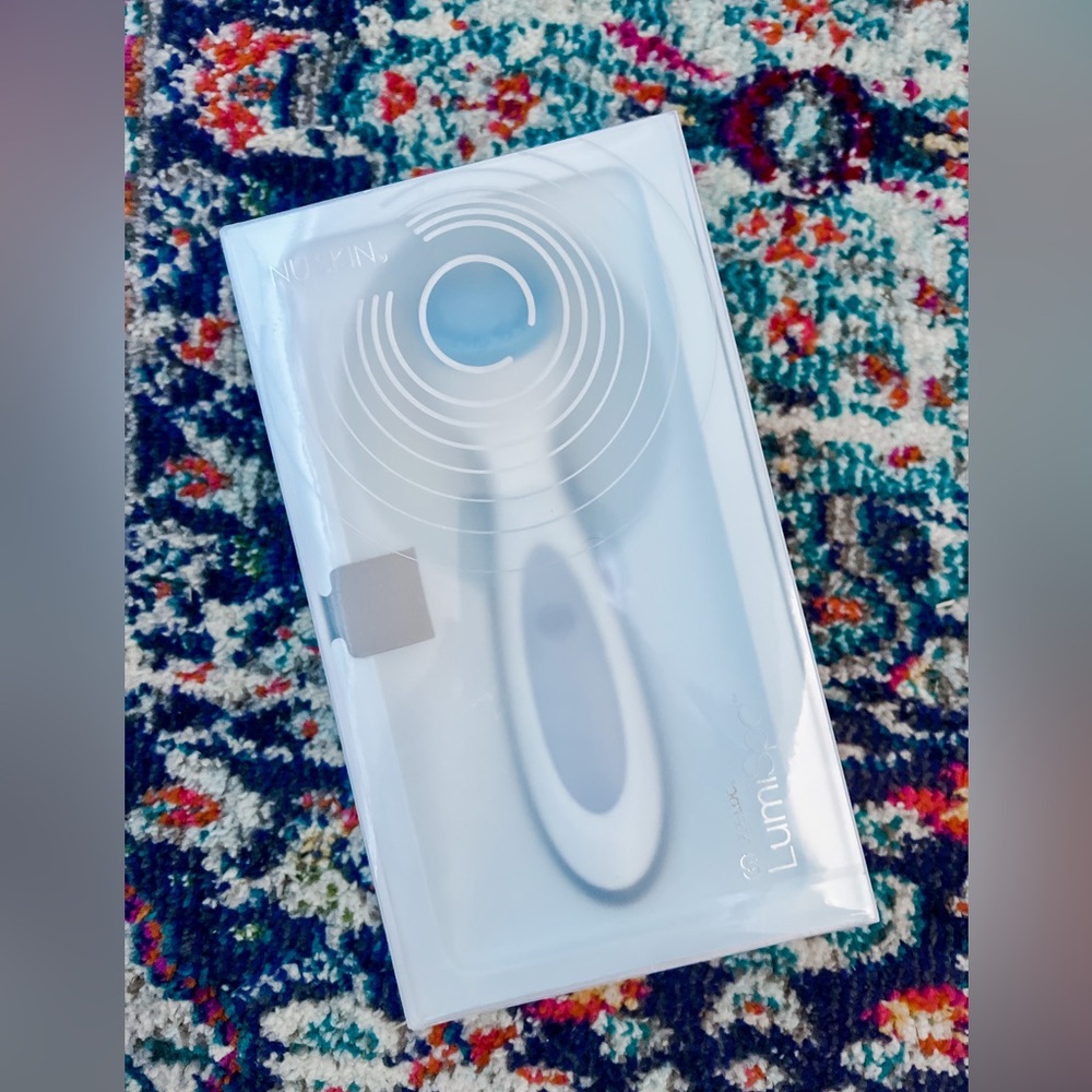 New in box with plastic wrap Original LumiSpa with acne cleanser
